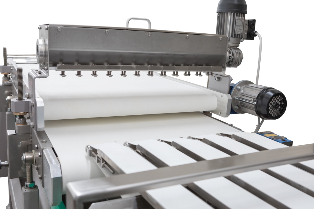 Close-up of dough sheeting rollers on a Caprea Fast Line